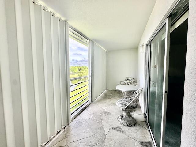 4091 Cornwall East, Unit 4091 Boca Raton, FL 33434 - Photo 13 of 27 a bathroom with a bathtub and a shower