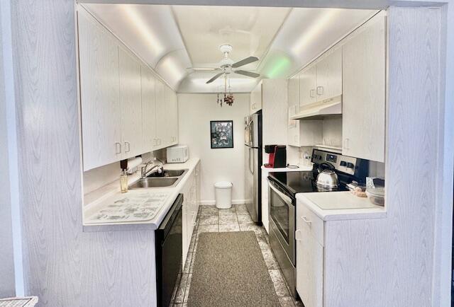 4091 Cornwall East, Unit 4091 Boca Raton, FL 33434 - Photo 2 of 27 a kitchen with stainless steel appliances granite countertop a sink stove and refrigerator