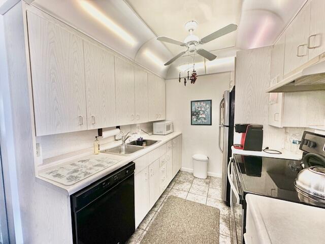 4091 Cornwall East, Unit 4091 Boca Raton, FL 33434 - Photo 4 of 27 a kitchen with stainless steel appliances granite countertop a sink dishwasher stove and refrigerator