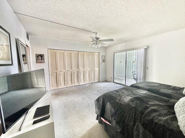 4091 Cornwall East, Unit 4091 Boca Raton, FL 33434 - Photo 10 of 27 a bedroom with a bed and a couch