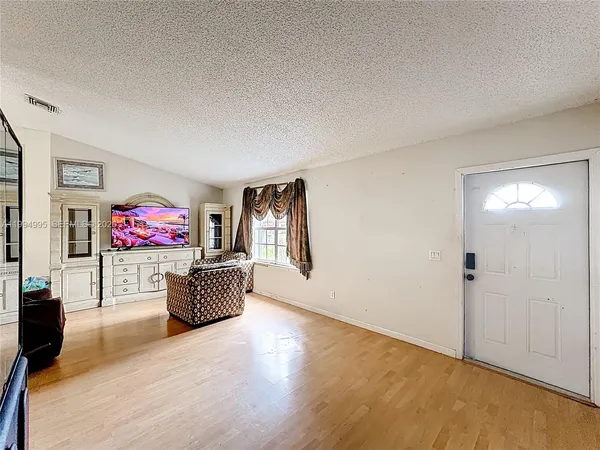 an entryway with livingroom and furniture