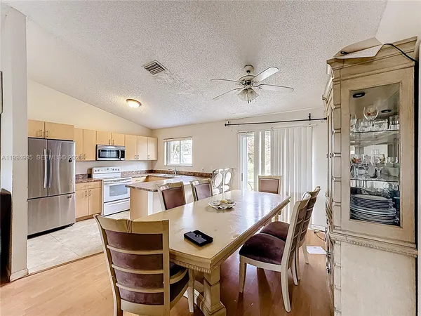 a view of a dining room with furniture