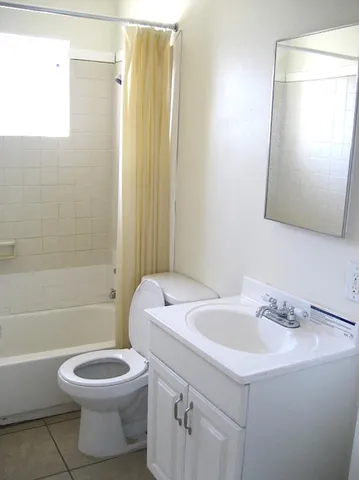 an empty room with a empty space and window