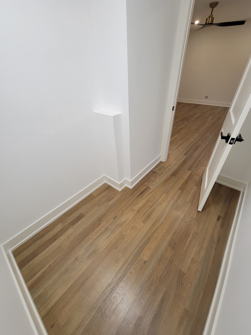 2S245 Mayfield Lane Glen Ellyn, IL 60137 - Photo 17 of 26 an empty room with wooden floor