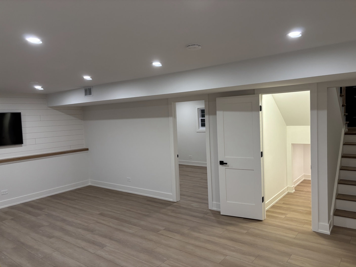 2S245 Mayfield Lane Glen Ellyn, IL 60137 - Photo 22 of 26 an empty room with wooden floor and windows