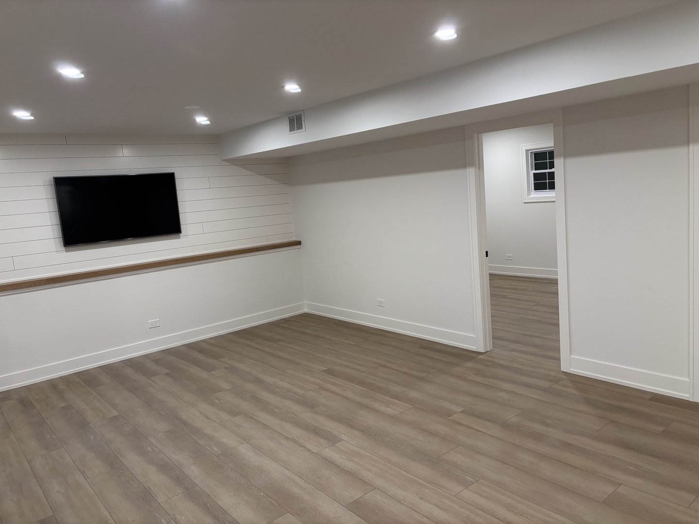 2S245 Mayfield Lane Glen Ellyn, IL 60137 - Photo 24 of 26 an empty room with wooden floor and windows