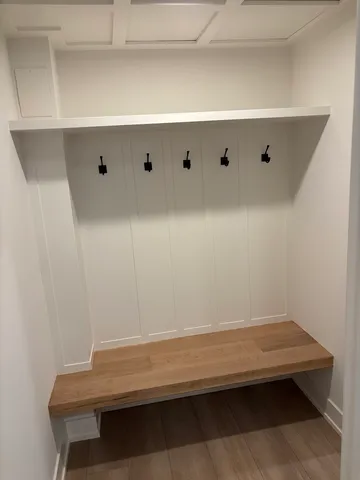 a view of a livingroom with washer and dryer