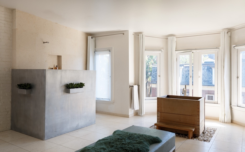 80 Appleton Street Boston, MA 02116 - Photo 17 of 30 a living room with furniture and a refrigerator