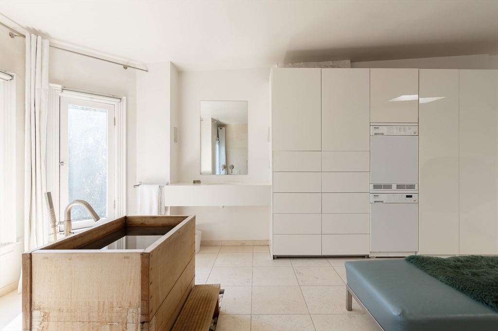 80 Appleton Street Boston, MA 02116 - Photo 18 of 30 a bathroom with a sink and tub