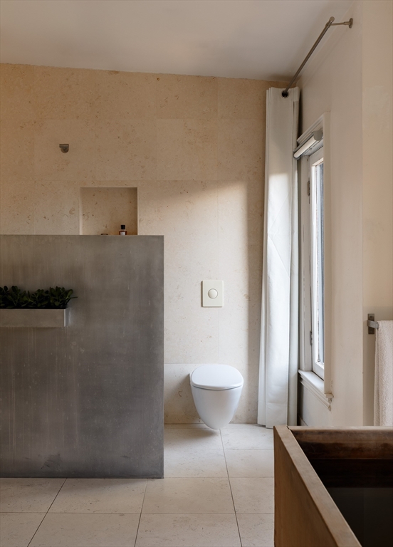 80 Appleton Street Boston, MA 02116 - Photo 20 of 30 a bathroom with a sink and a toilet