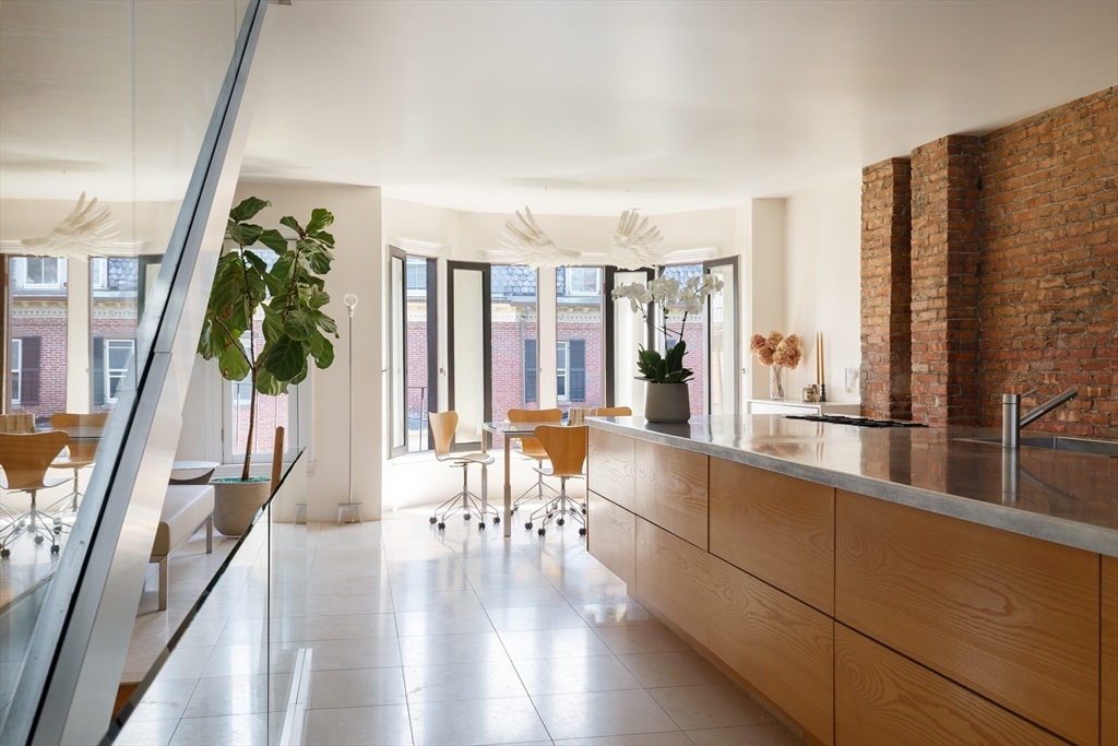 80 Appleton Street Boston, MA 02116 - Photo 7 of 30 a living room with large windows and furniture