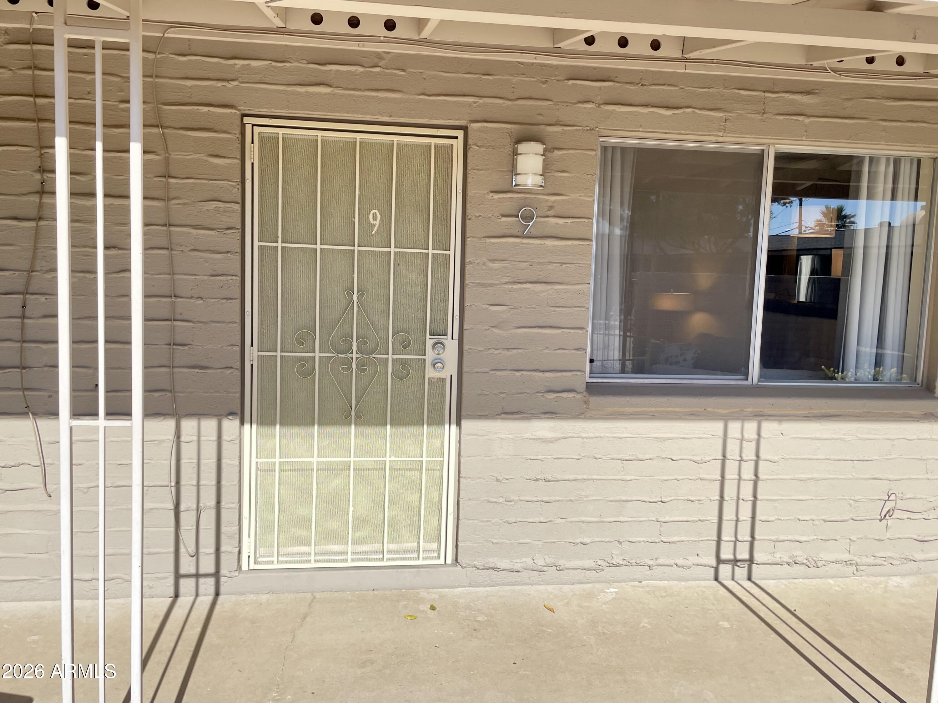 6819 North 12th Street, Unit 9 Phoenix, AZ 85014 - Photo 18 of 21 a view of a door with a door