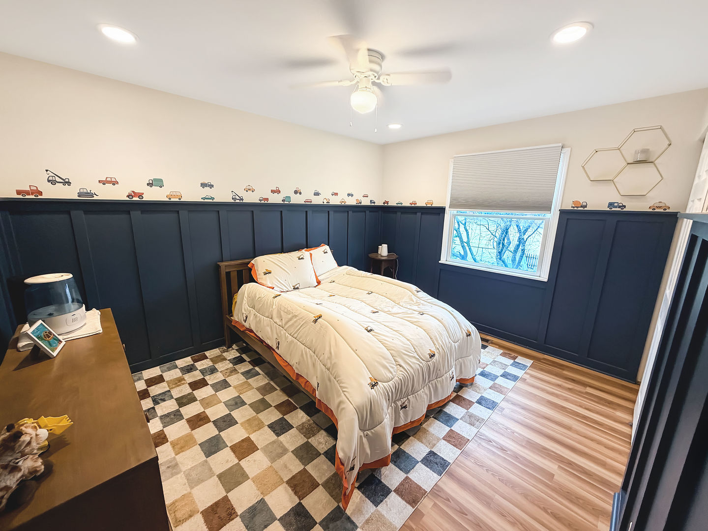 104 McClellan Street Bartlett, IL 60103 - Photo 14 of 21 a bedroom with a bed and a chandelier