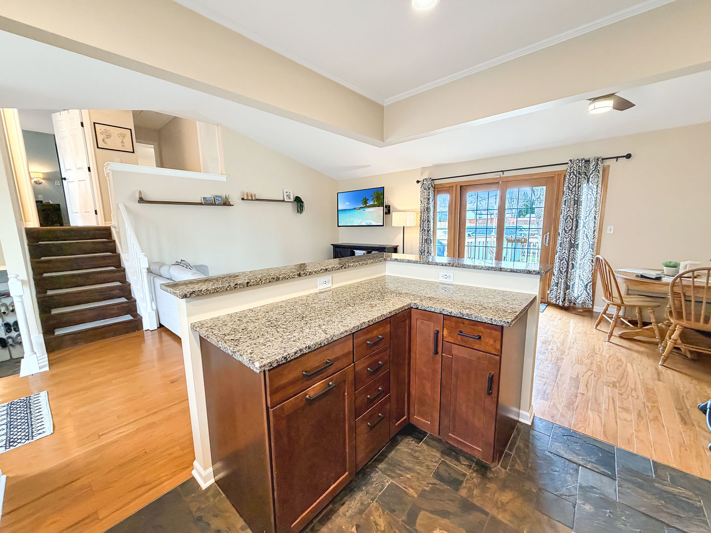 104 McClellan Street Bartlett, IL 60103 - Photo 6 of 21 a kitchen with a stove a sink and a refrigerator