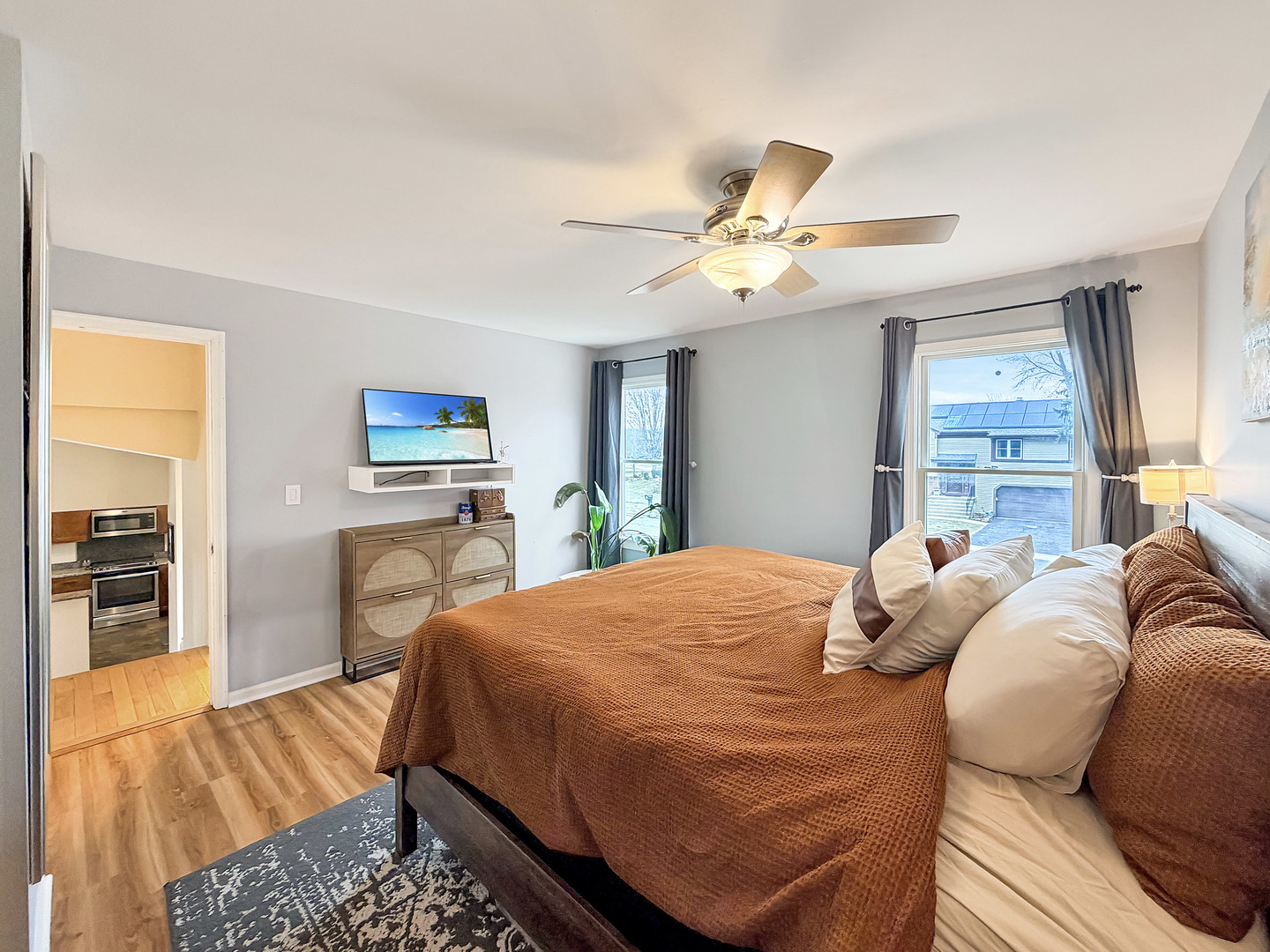 104 McClellan Street Bartlett, IL 60103 - Photo 8 of 21 a bed room with a bed and a chandelier