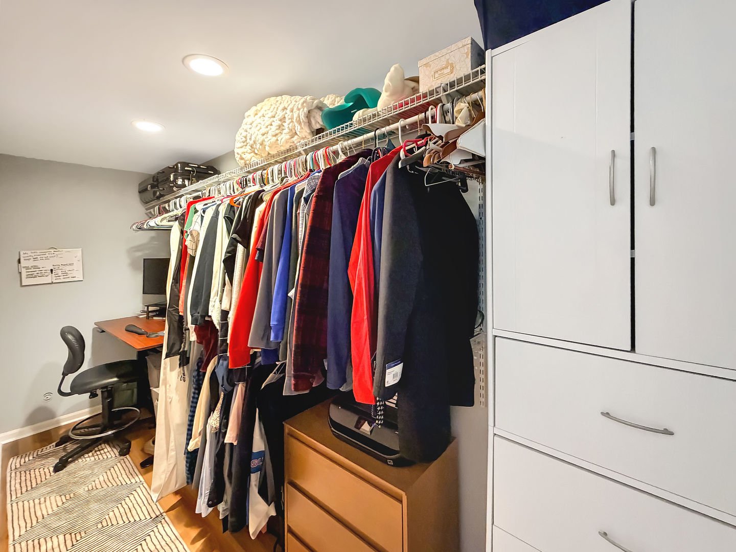 104 McClellan Street Bartlett, IL 60103 - Photo 10 of 21 a view of walk in closet with clothes and shoes