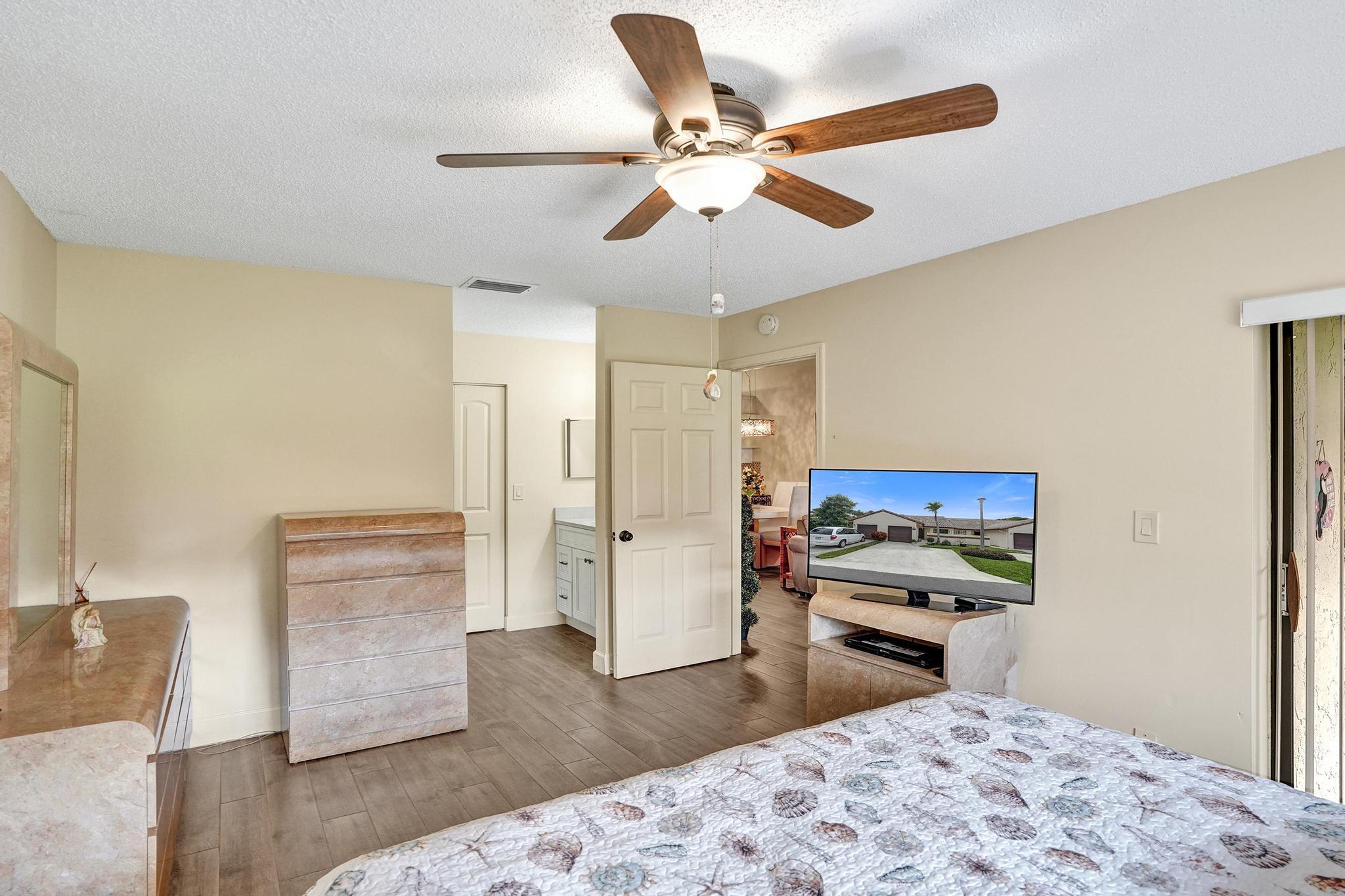410 Buttonwood Place Boca Raton, FL 33431 - Photo 24 of 46 Primary Bedroom