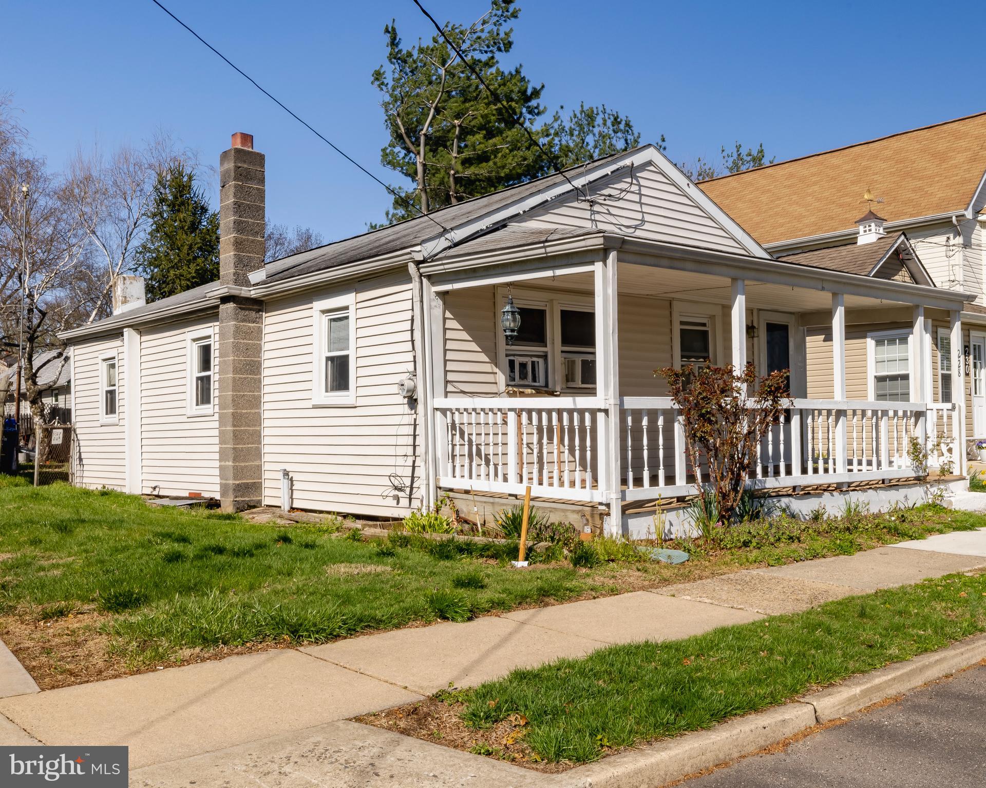 228 Rancocas Avenue Delanco, NJ 08075 - Photo 2 of 14 a front view of a house with a yard