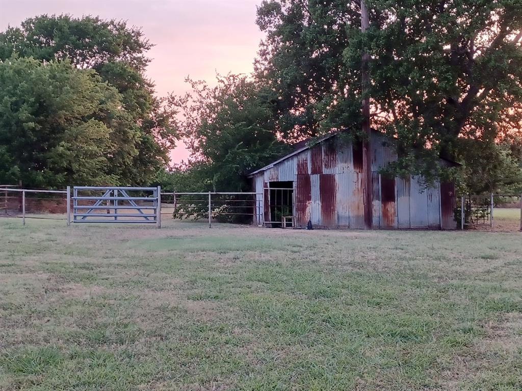 1515 Fannin Road Melissa, TX 75454 - Photo 3 of 4 a view of a house with a yard