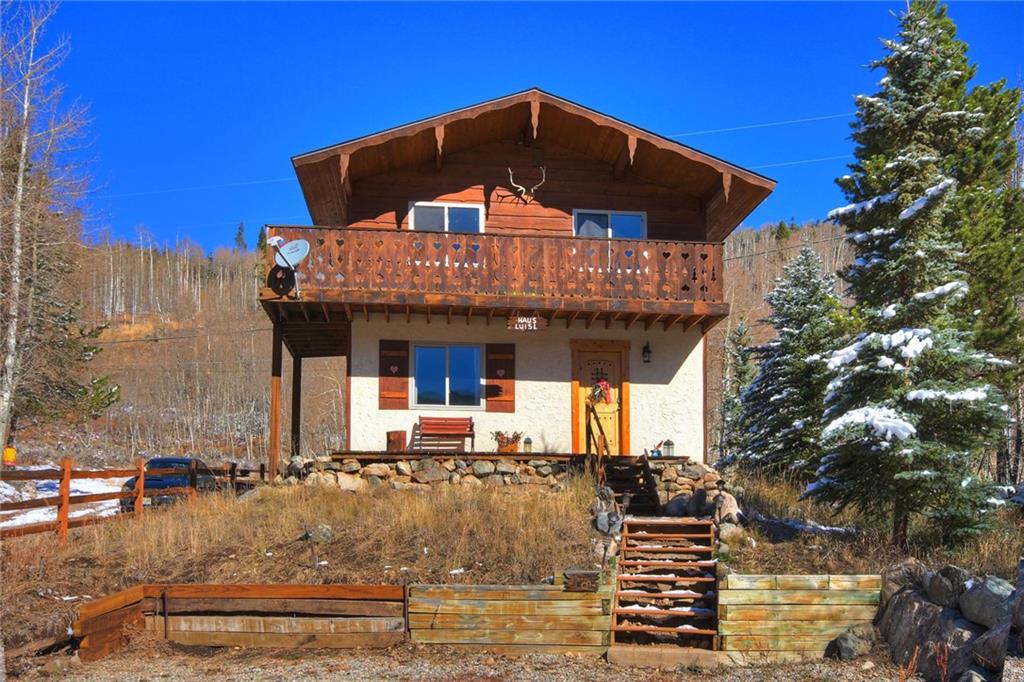 187 Rasor Drive Keystone, CO 80435 - Photo 3 of 24 a front view of a house with a yard