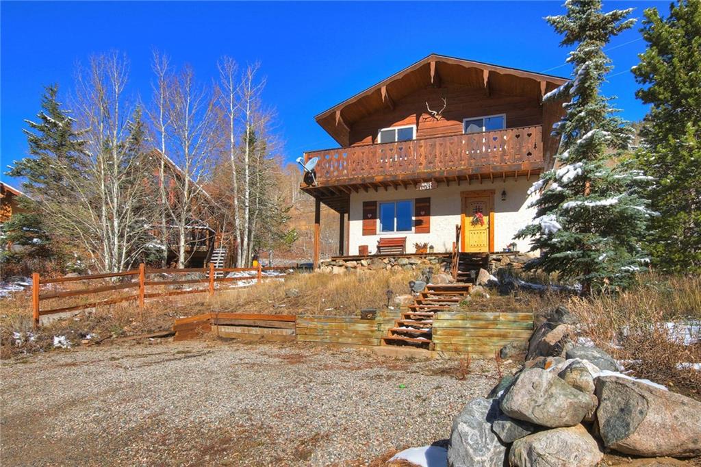 187 Rasor Drive Keystone, CO 80435 - Photo 23 of 24 a front view of a house with a yard