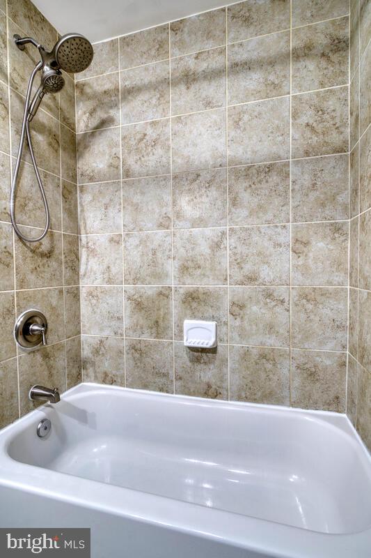 340 Gusryan Street Baltimore, MD 21224 - Photo 19 of 34 a bathroom with a shower