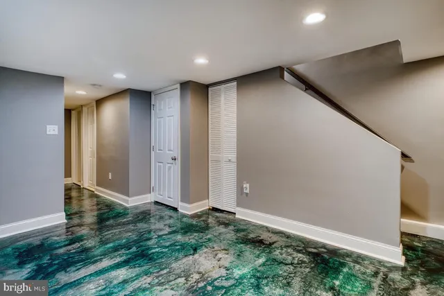 a view of entryway with wooden walls