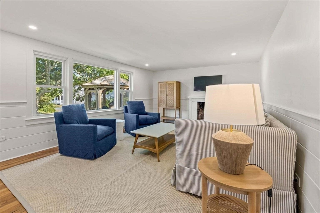 72 Forest Beach Road Chatham, MA 02659 - Photo 12 of 32 a living room with furniture and a large window