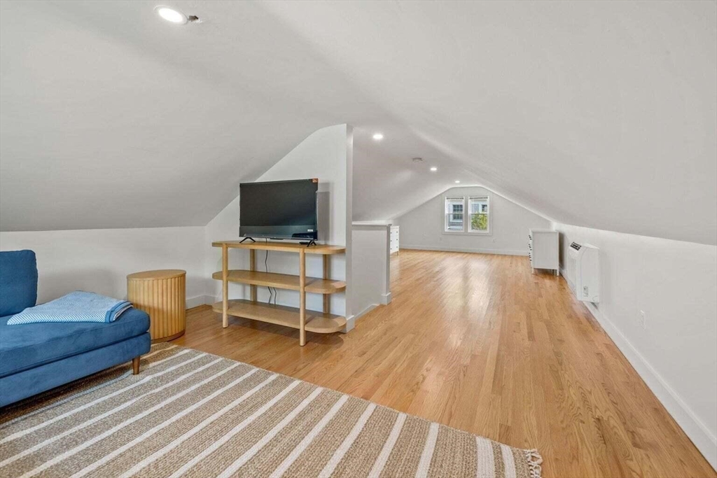 72 Forest Beach Road Chatham, MA 02659 - Photo 17 of 32 a living room with furniture and a flat screen tv