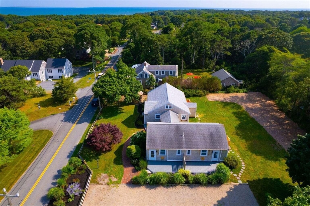 72 Forest Beach Road Chatham, MA 02659 - Photo 6 of 32 an aerial view of a house with garden space and street view