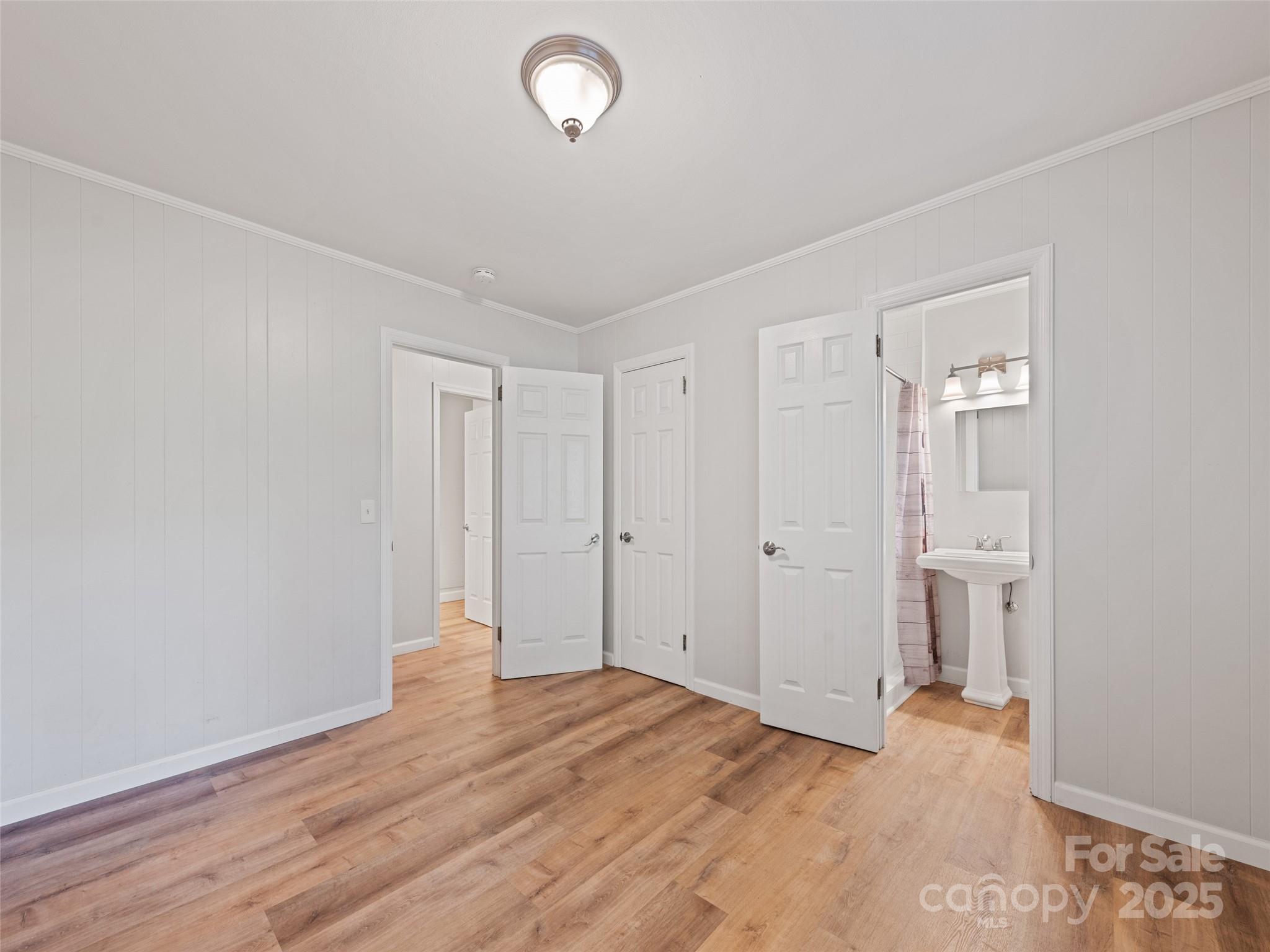 263 Blanton Street Columbus, NC 28722 - Photo 26 of 45 a view of empty room with wooden floor