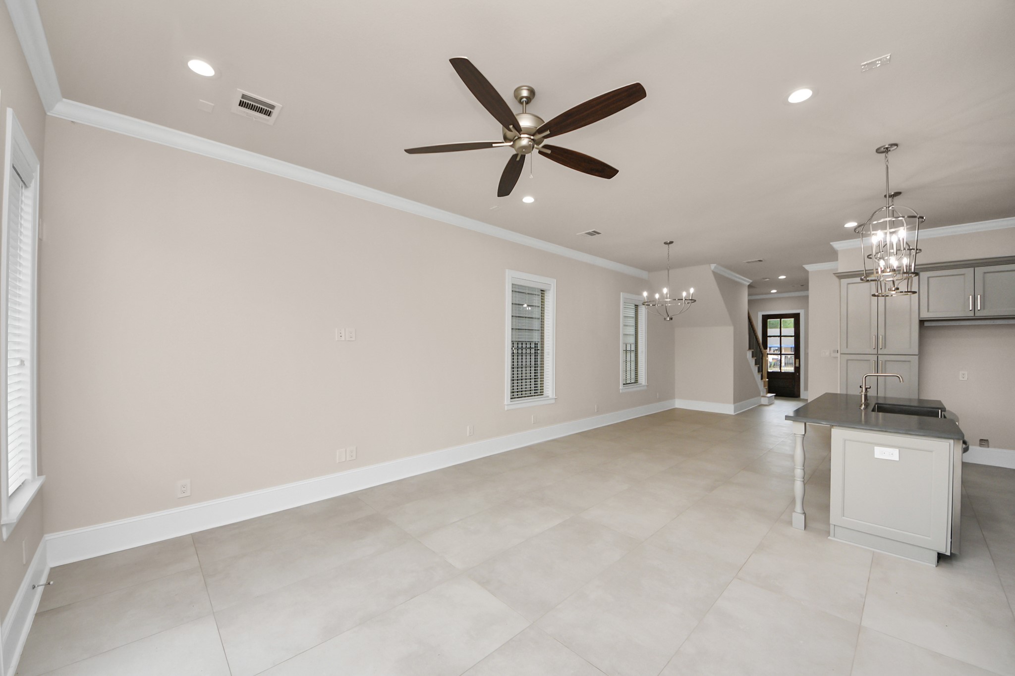 6320 Milwee Street, Unit B Houston, TX 77092 - Photo 21 of 43 a view of a livingroom with a ceiling fan and window
