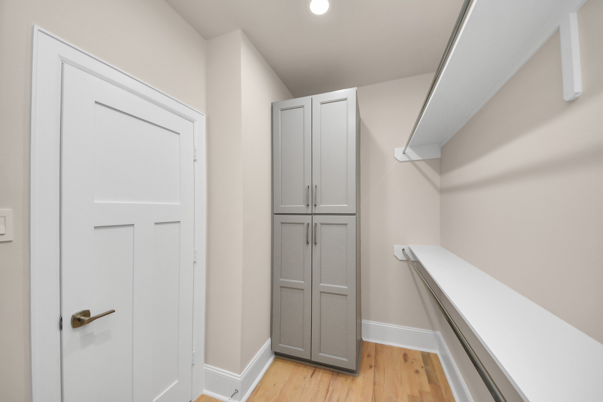 6320 Milwee Street, Unit B Houston, TX 77092 - Photo 32 of 43 a view of a hallway with wooden floor