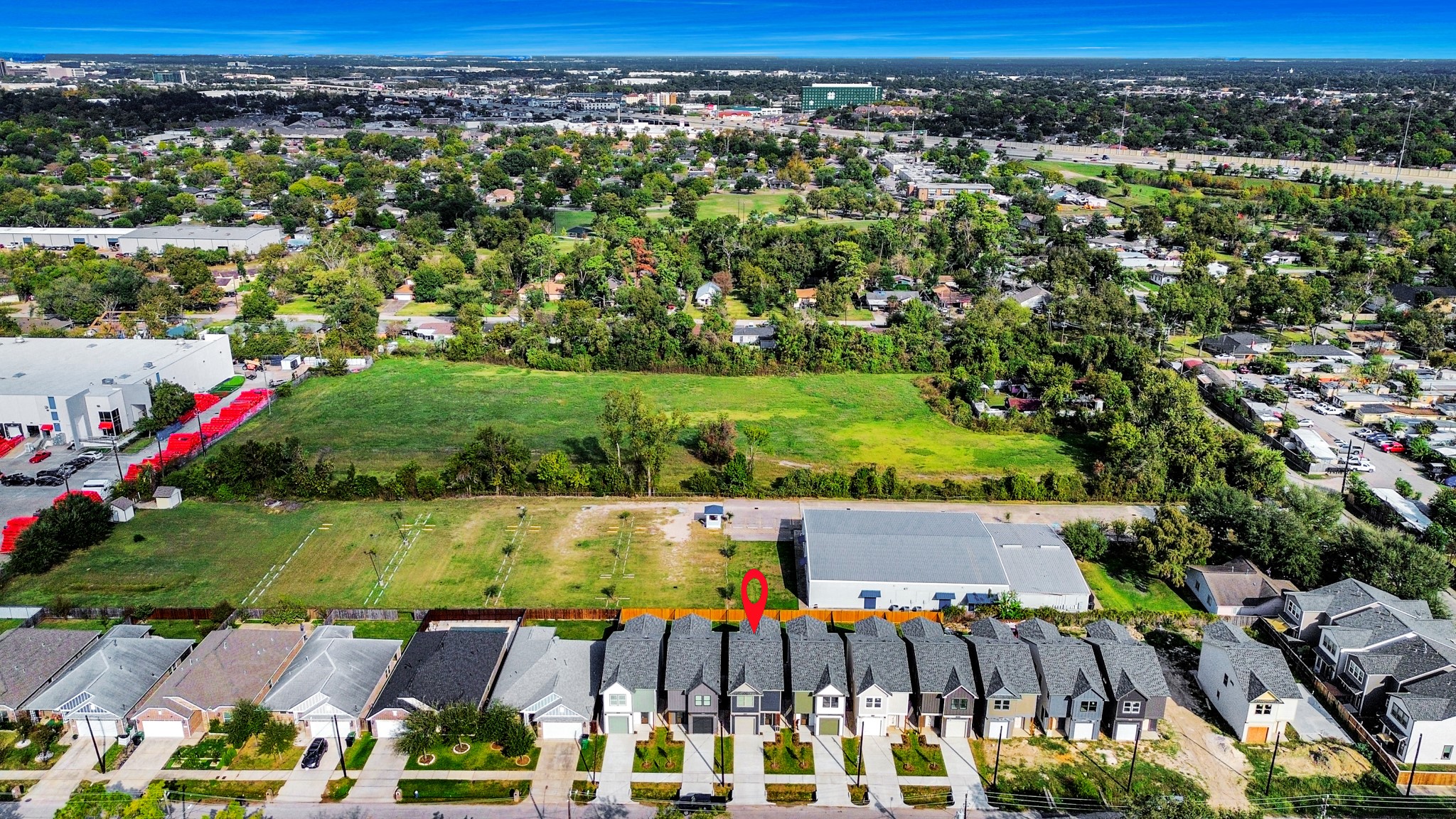 6320 Milwee Street, Unit B Houston, TX 77092 - Photo 42 of 43 an aerial view of multiple houses with yard