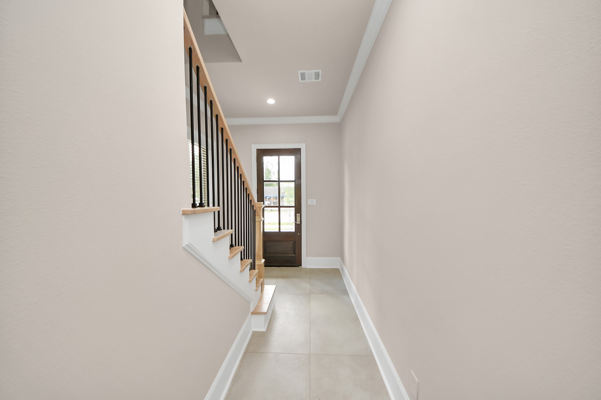 6320 Milwee Street, Unit B Houston, TX 77092 - Photo 7 of 43 a view of a hallway with a white walls