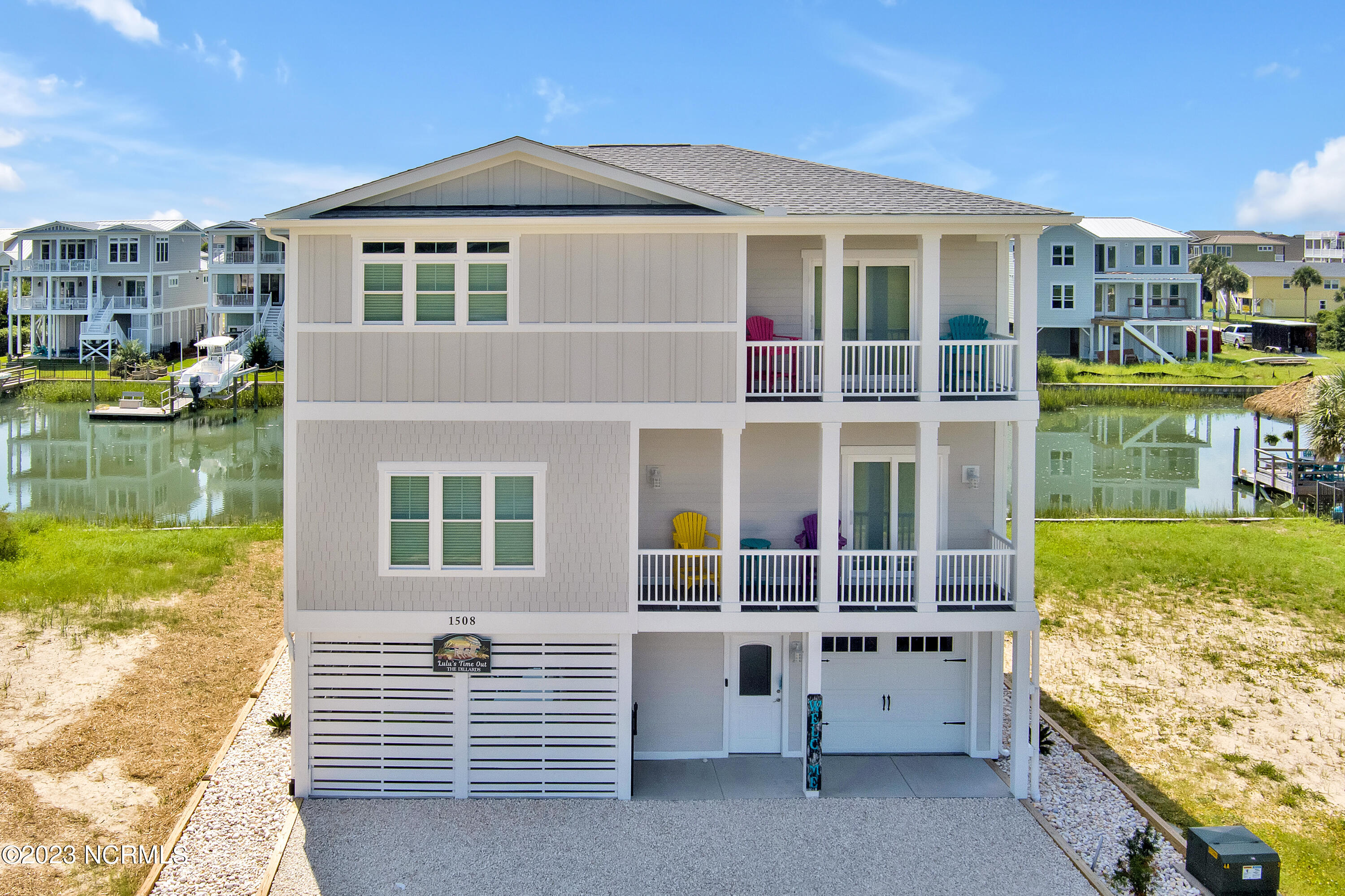 1508 Riverside Drive Sunset Beach, NC 28468 - Photo 2 of 38 1508RiversideDriveSkyView_01