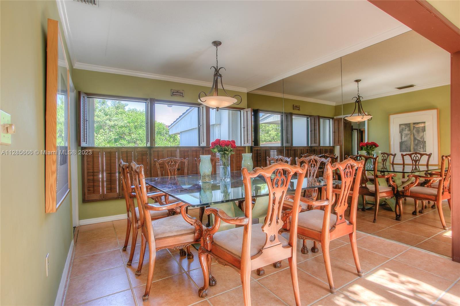 9670 Southwest 96th Court Miami, FL 33176 - Photo 19 of 21 a view of a dining room with furniture window and outside view