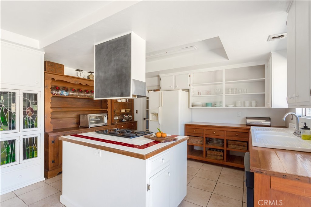 28492 Lilac Road Valley Center, CA 92082 - Photo 13 of 22 Island w/ slide in range