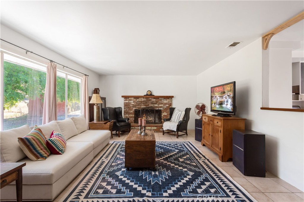 28492 Lilac Road Valley Center, CA 92082 - Photo 8 of 22 Wood burning fireplace