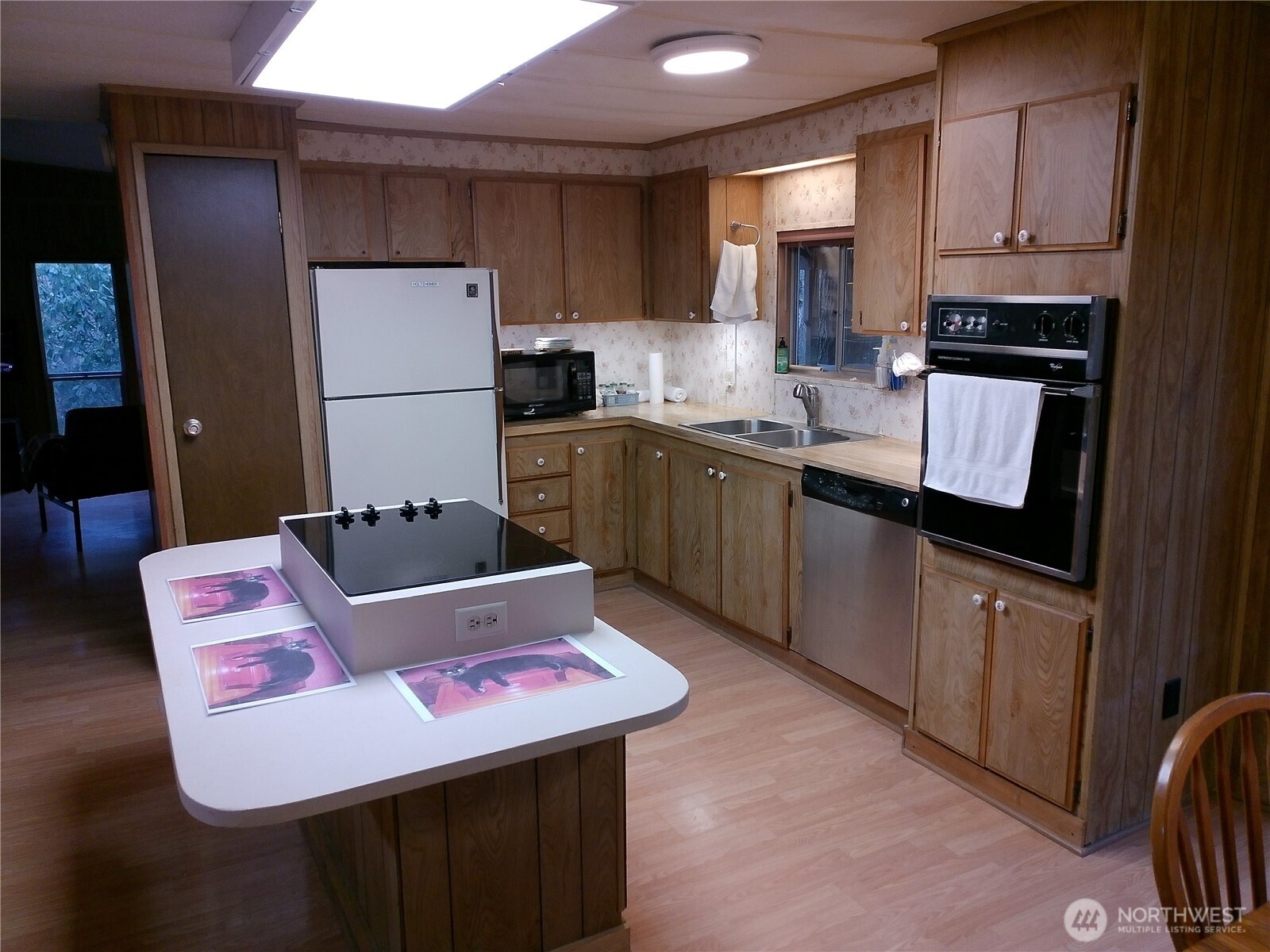 3824 Birch Bay Lynden Road Custer, WA 98240 - Photo 3 of 23 a kitchen with stainless steel appliances granite countertop a sink refrigerator and cabinets