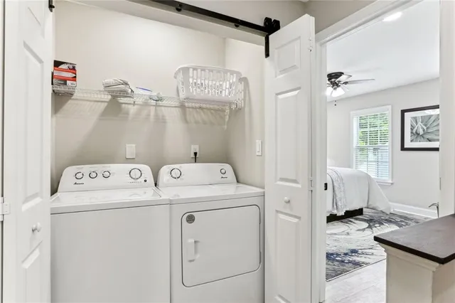 a utility room with dryer and washer