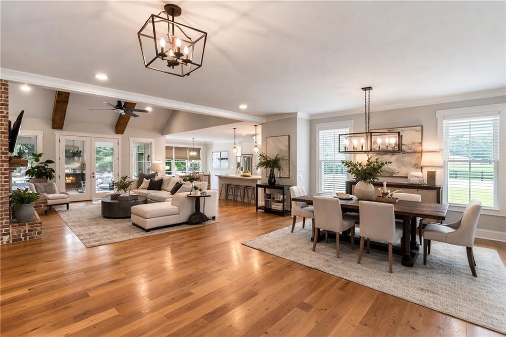 3511 Reavis Mountain Road, Unit 2 Ball Ground, GA 30107 - Photo 3 of 14 a living room with furniture or window and a wooden floor