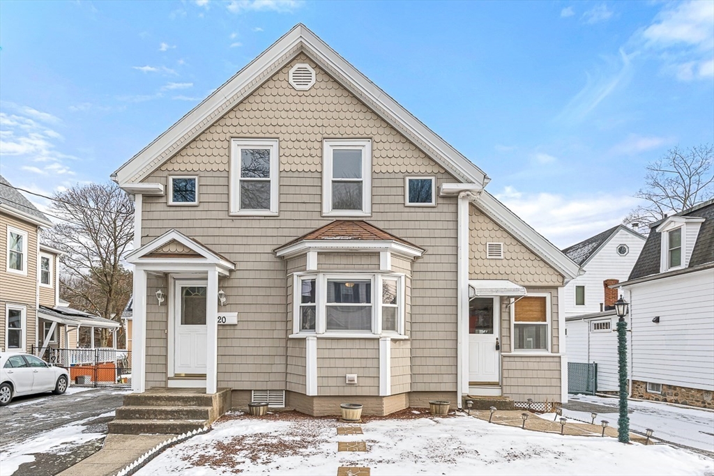 20 Pond Street Stoneham, MA 02180 - Photo 2 of 35 a front view of a house with a yard