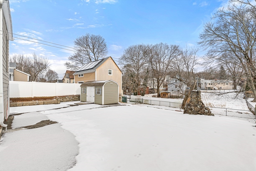 20 Pond Street Stoneham, MA 02180 - Photo 28 of 35 a view of a house with snow on the road