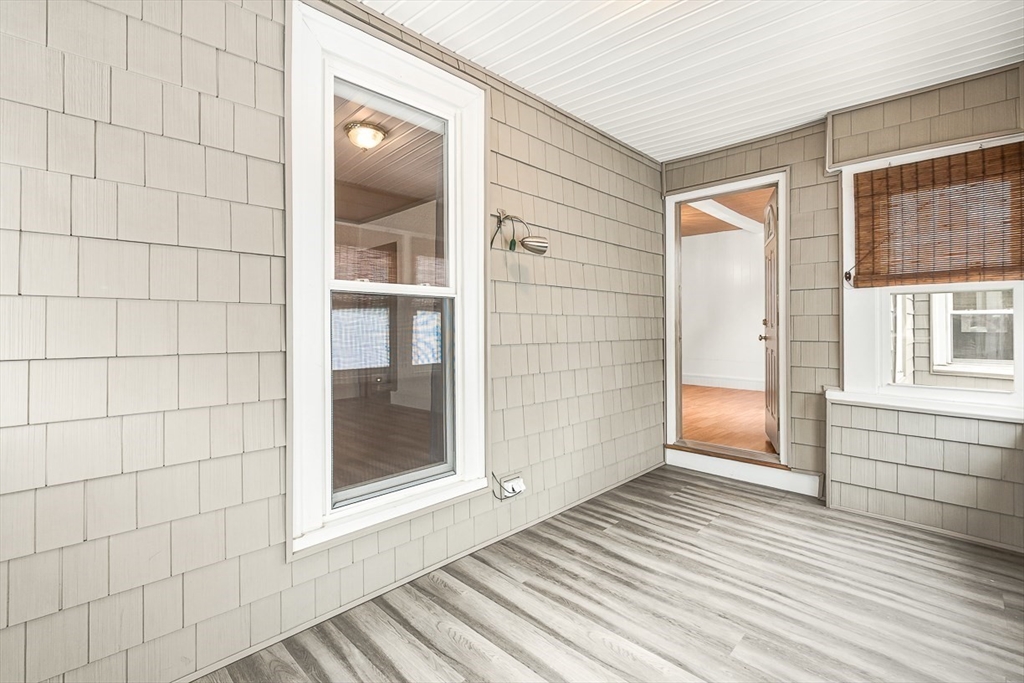 20 Pond Street Stoneham, MA 02180 - Photo 6 of 35 a view of an empty room with glass door