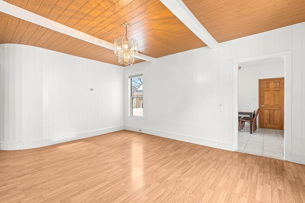 20 Pond Street Stoneham, MA 02180 - Photo 9 of 35 a view of a hallway view with wooden floor and staircase
