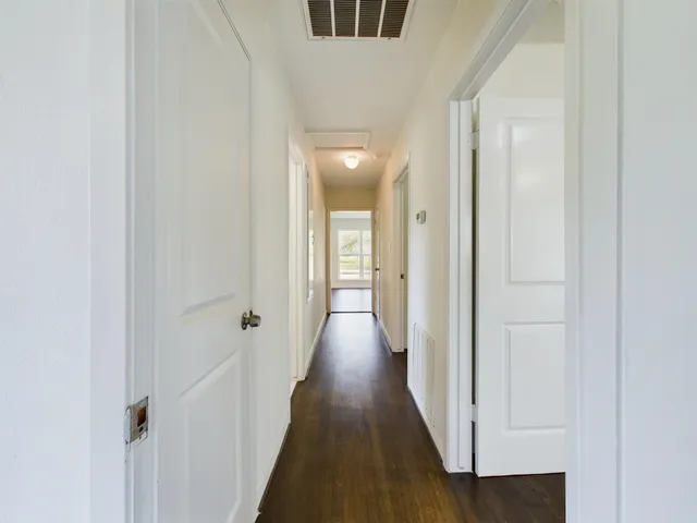 a view of hallway with closet