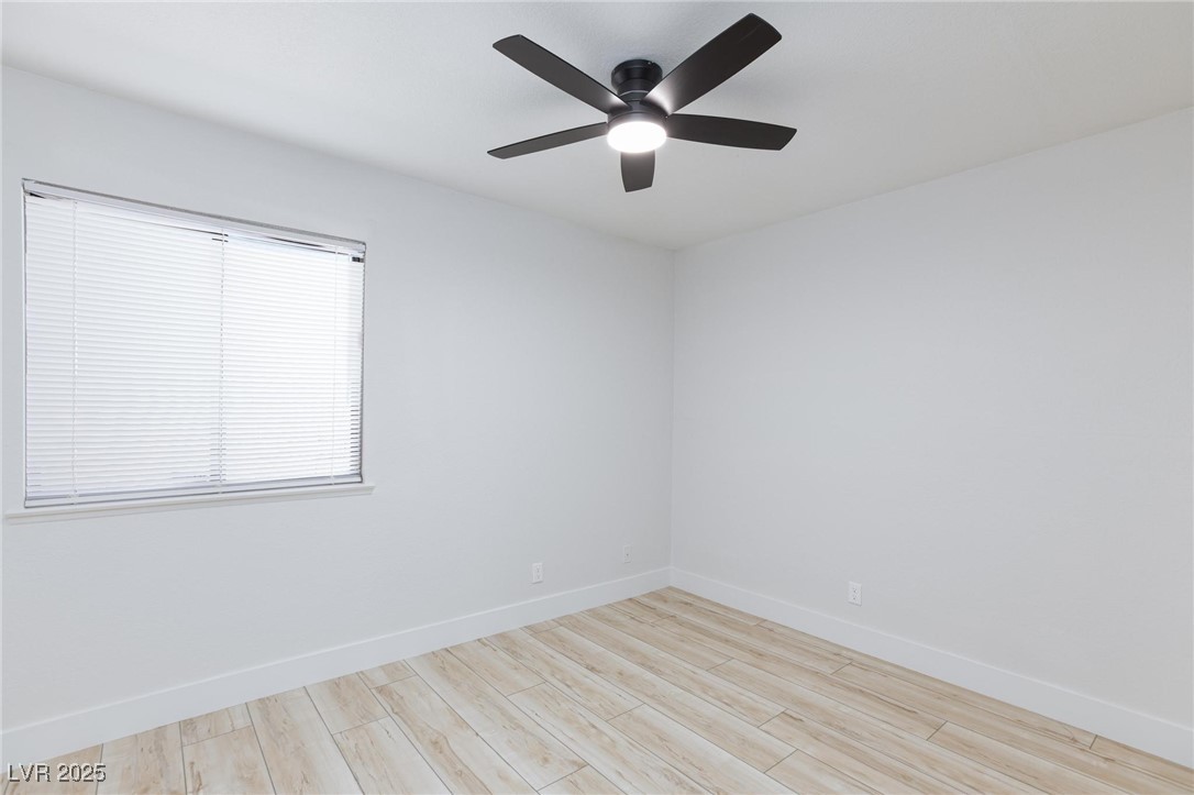5905 Smoke Ranch Road, Unit A Las Vegas, NV 89108 - Photo 20 of 31 Spare room featuring light wood-type flooring and ceiling fan