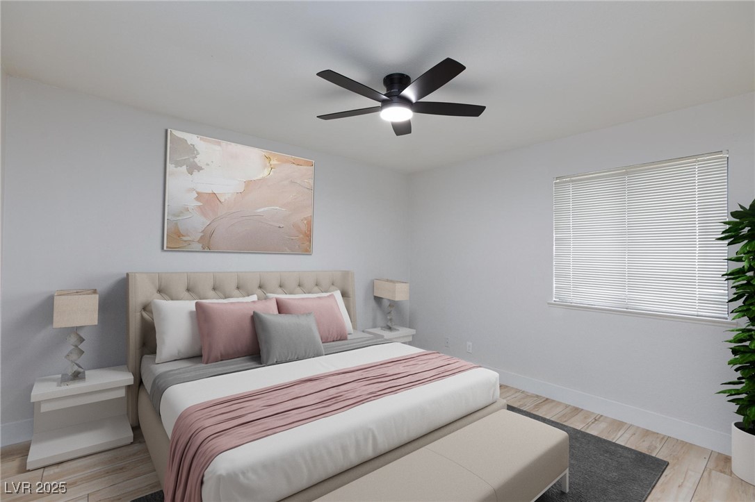 5905 Smoke Ranch Road, Unit A Las Vegas, NV 89108 - Photo 22 of 31 Bedroom featuring light wood-style flooring and ceiling fan