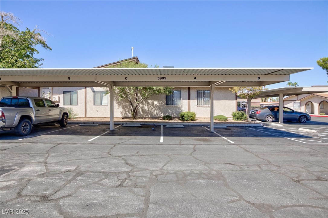 5905 Smoke Ranch Road, Unit A Las Vegas, NV 89108 - Photo 26 of 31 View of covered parking lot